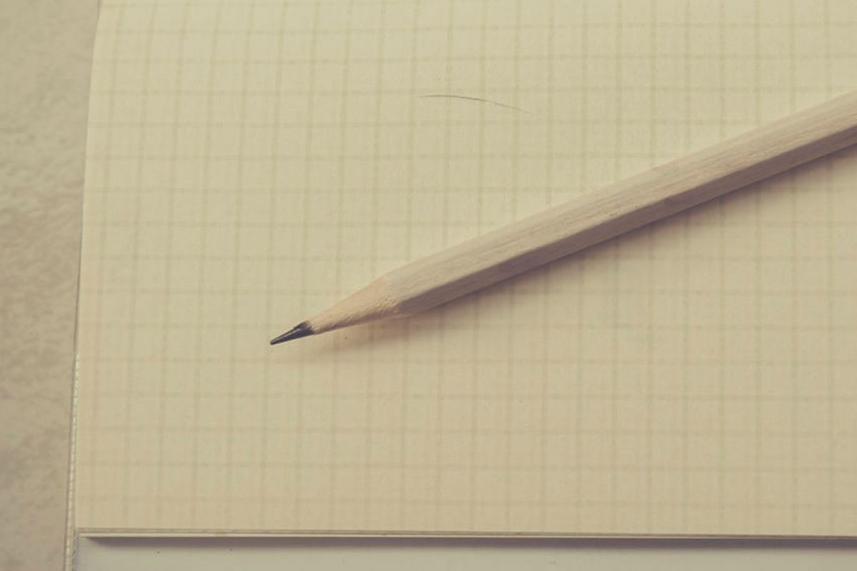 Notizzettel und Bleistift